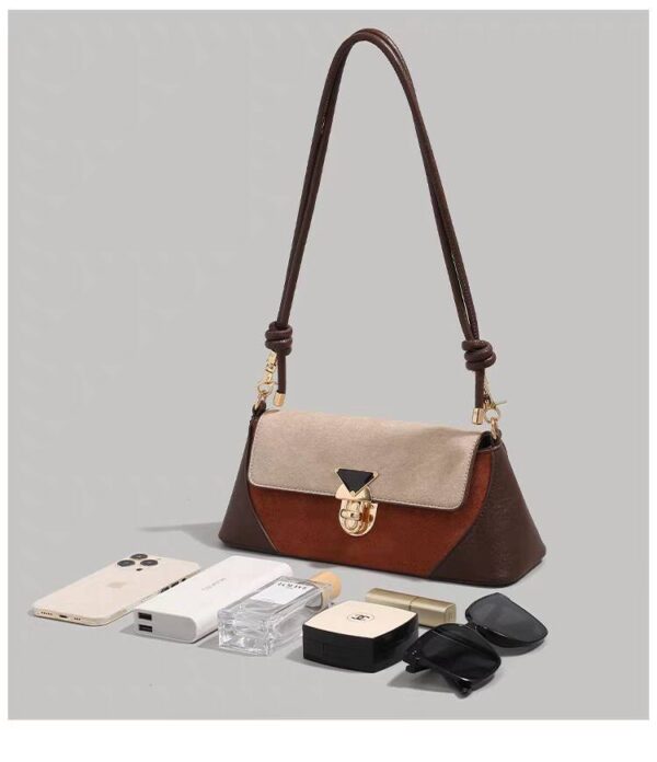Elegant Contrast: Black & Beige Crossbody Bag with Gold Accents