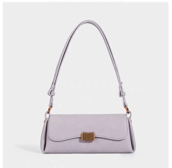 Charlene & Kangaroo: The Classic Black Shoulder Bag with Gold Hardware